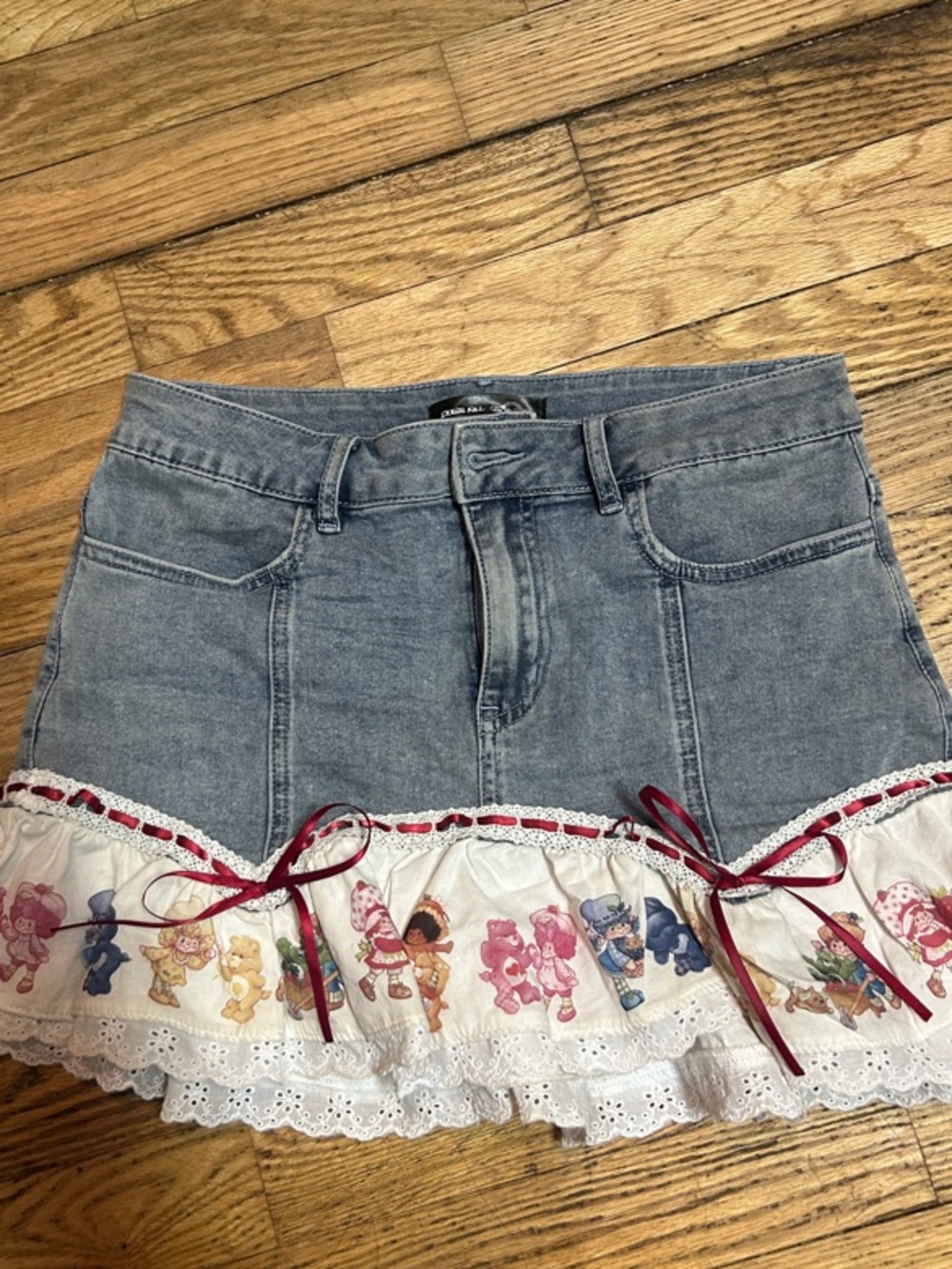 Denim Mini Skirt with Printed strawberry shortcake & Care Bears crew.